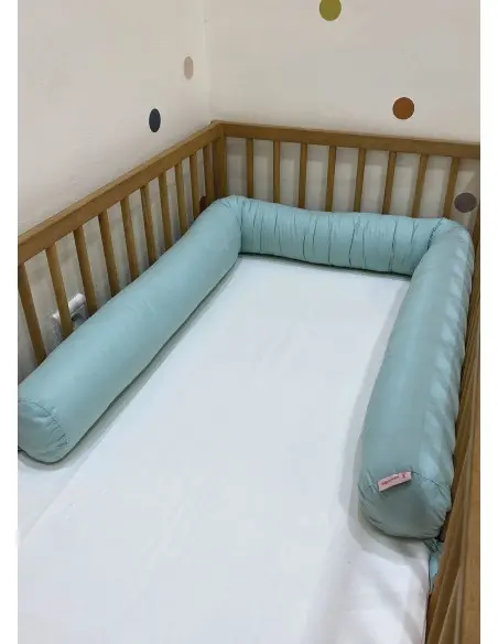 Minitribe Traversin pour bébé Vert Pastel Univers Bébé -