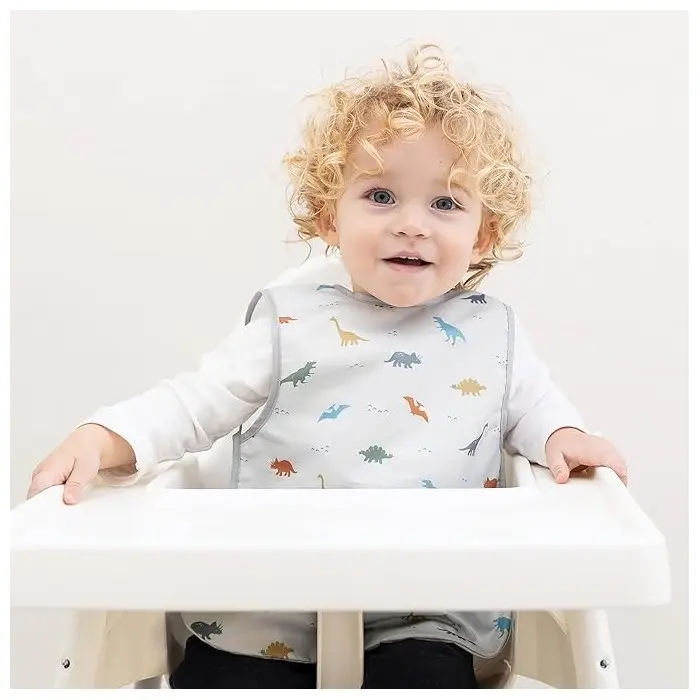 Tiny Twinkle Bavoir imperméable sans manches 6m+ Dinosaure
