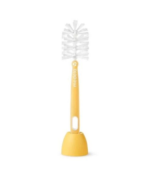 Medela brush with holder