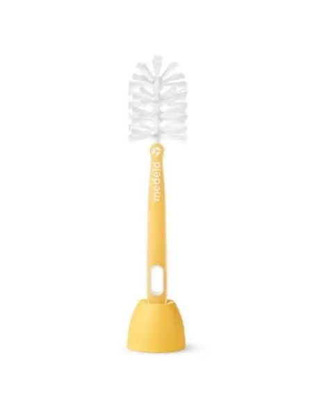 Medela brush with holder